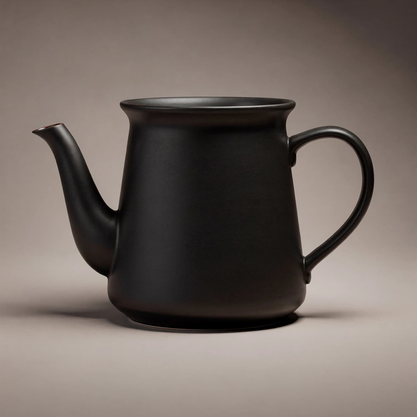 FLUX.2 product shot of a matte black ceramic pour-over kettle on a seamless warm gray backdrop