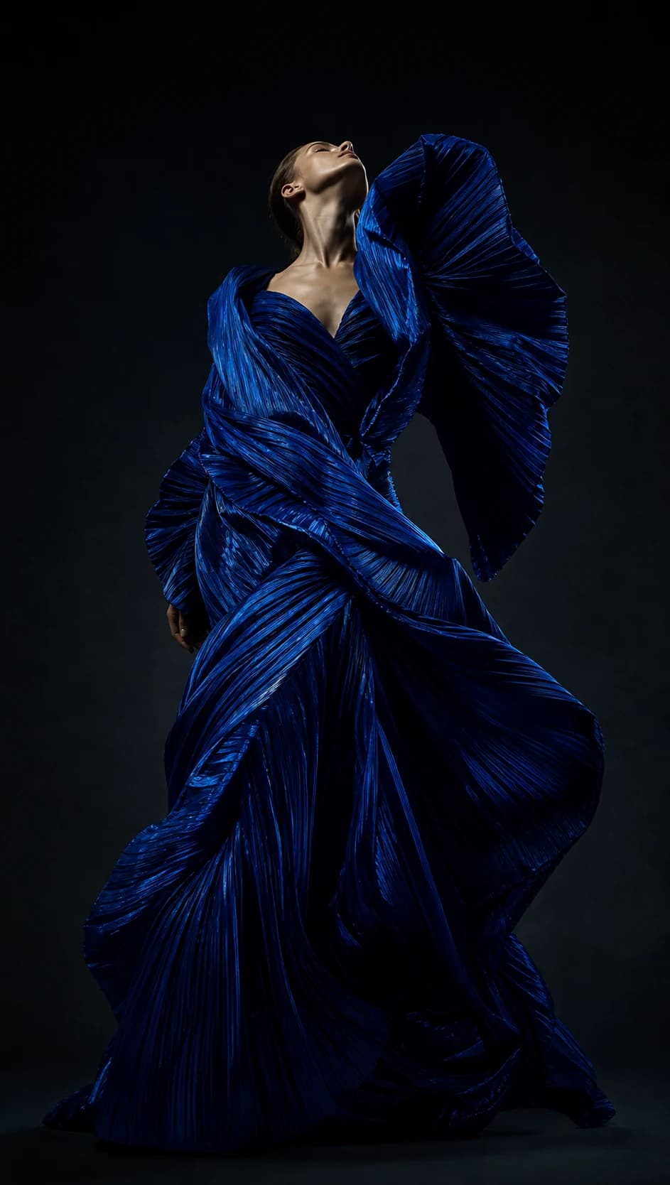 Cobalt couture silhouette in motion